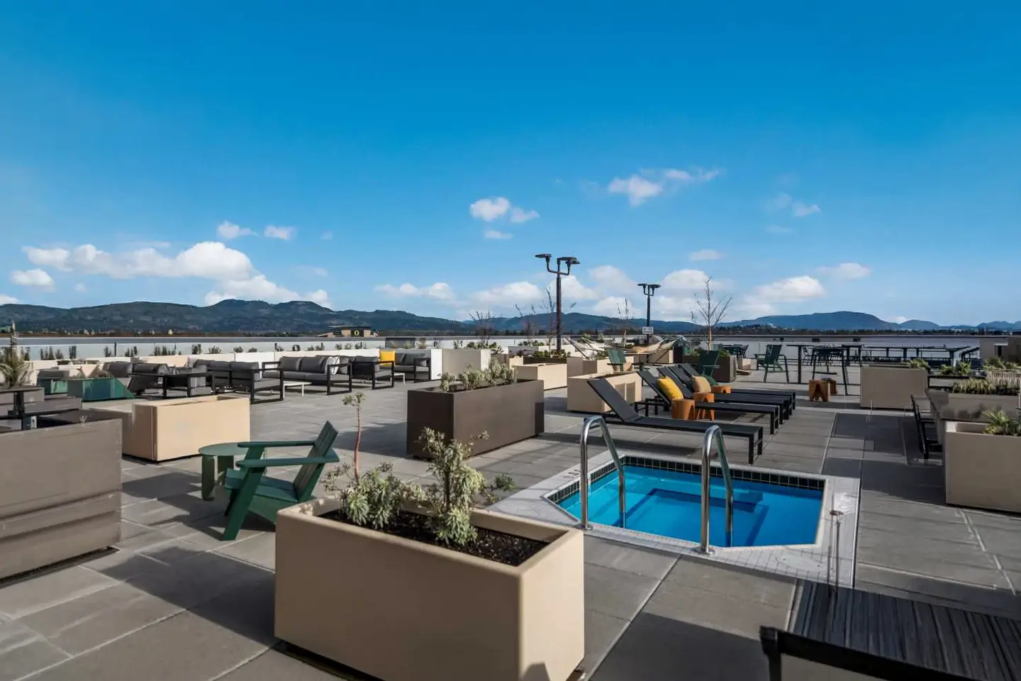 heated swimming pool and rooftop lounge seating